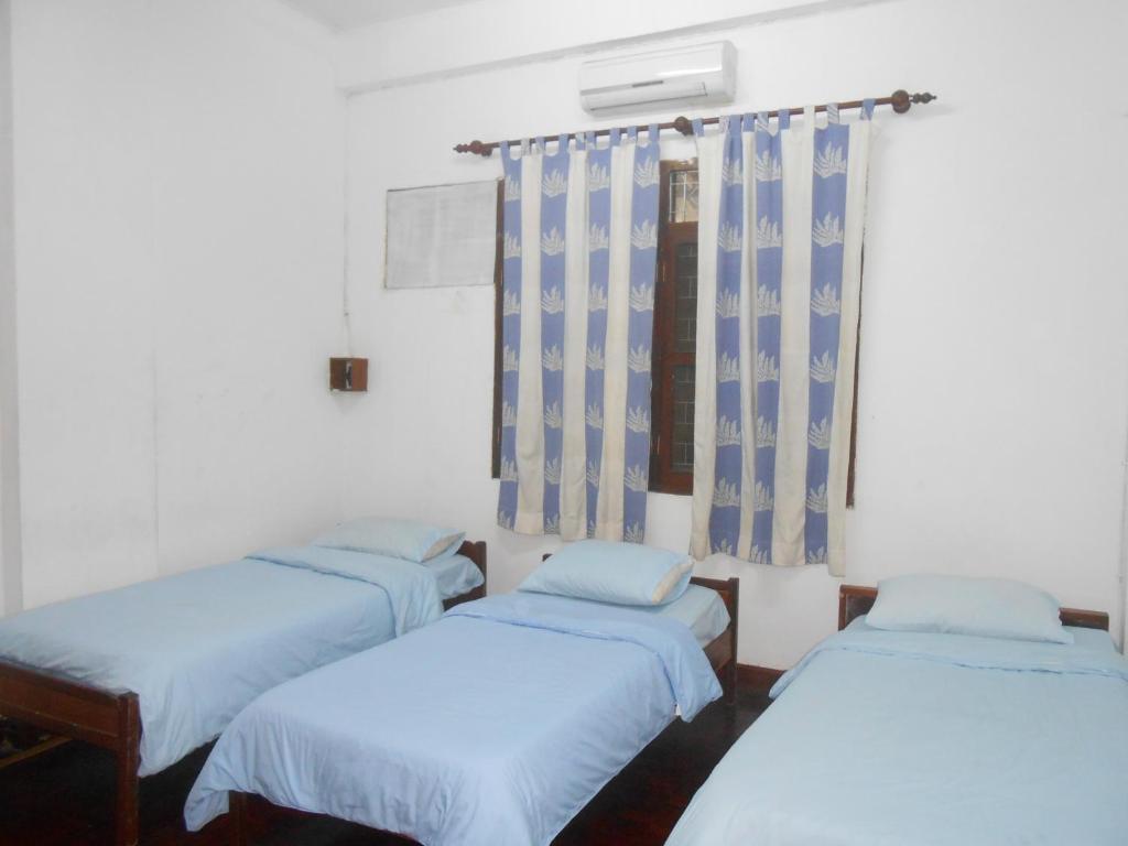 Saysouly Guesthouse Vientiane Bilik gambar